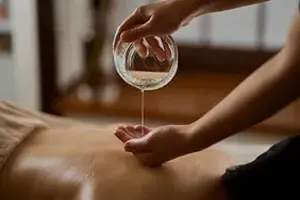 Pouring Massage Oil edited 1